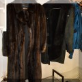 H01. Fur coat and black shearling jacket. 